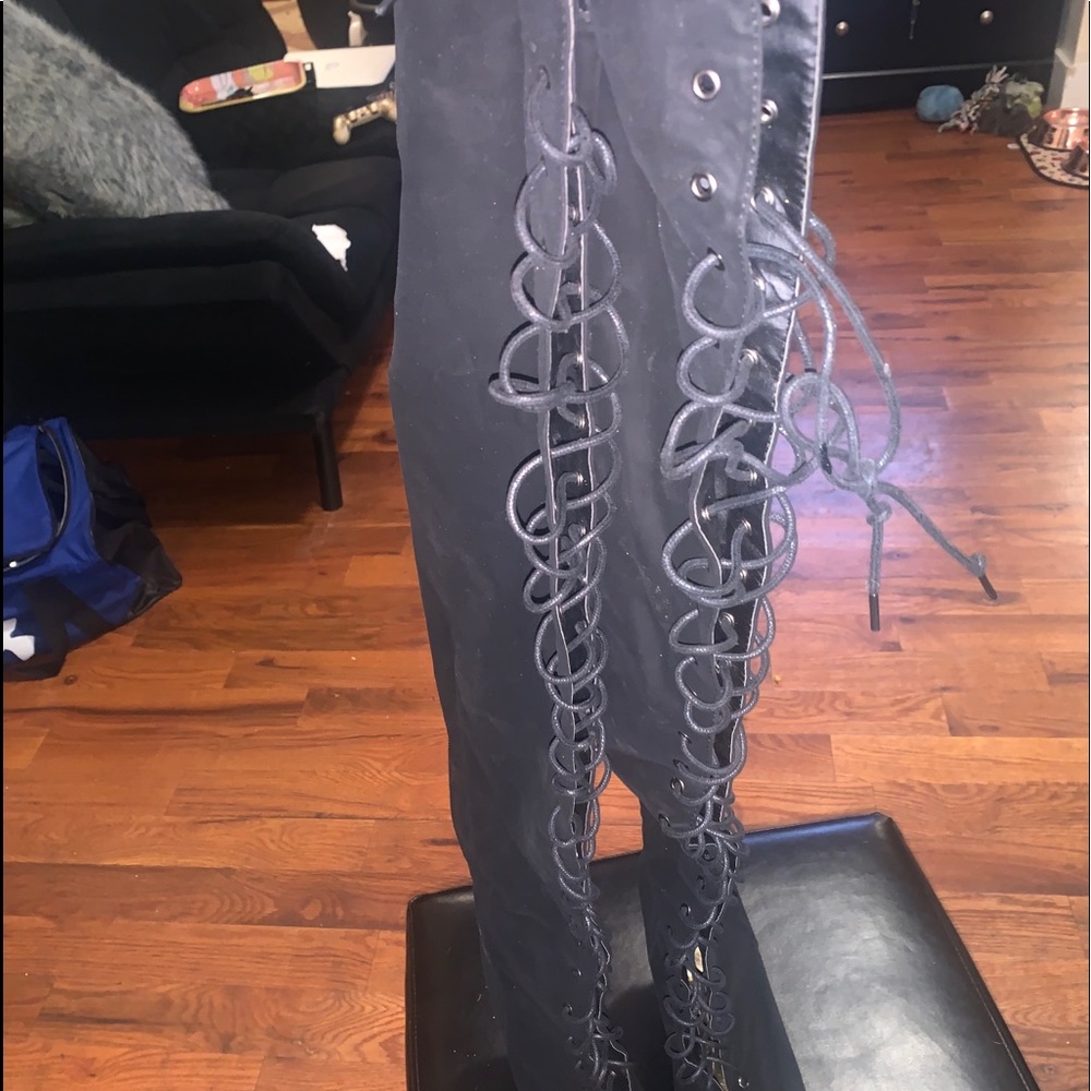 Knee high lace up boots